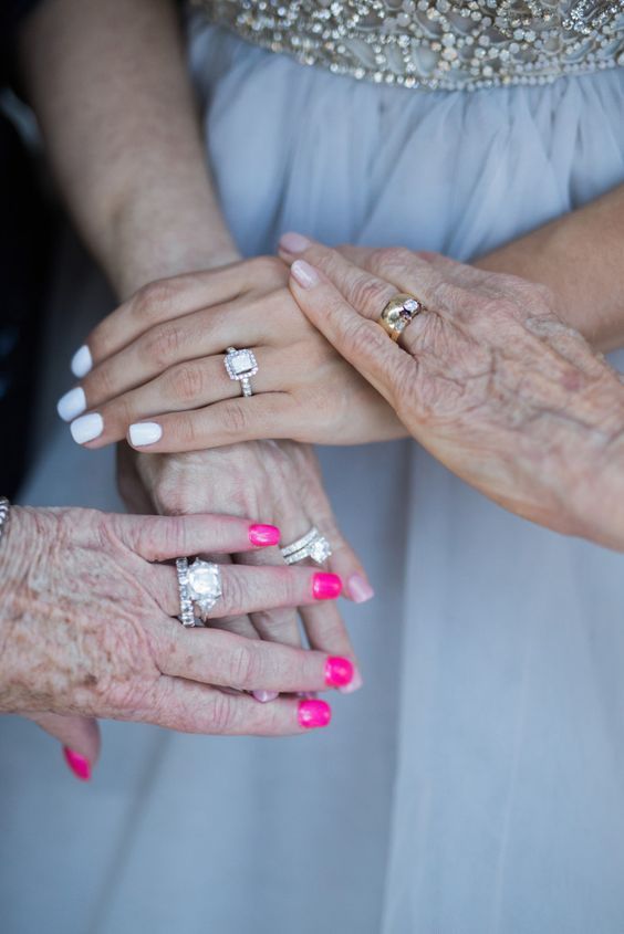 emotional photo of engagement rings wwith mom and grandma