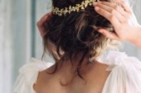 05 finish your boho or just romantic look with a messy updo and a gold headpiece
