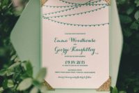 05 mint envelope with gold corners and an ivory invitation