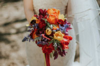 06 The bridal bouquet was a super bold one, in red, peach, yellow and lavender colors