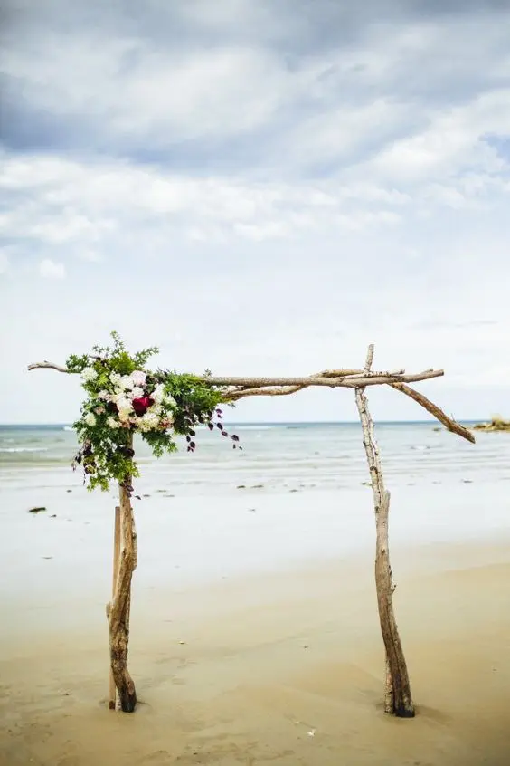 driftwood arch with floral corner decor