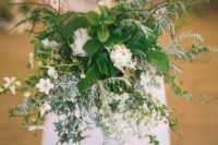 07 Her textural greenery bouquet fully reflected the forest wedding theme chosen