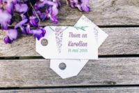 07 The wedding stationery highlighted the theme, it featured watercolor wisteria