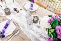 09 Beautiful glass bottles, subtle fabrics and lots of flowers is right what we need for a spring wedding table