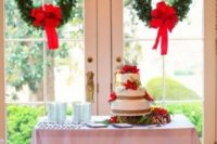 09 fir wreath with red ribbon is a cool idea for venue decor