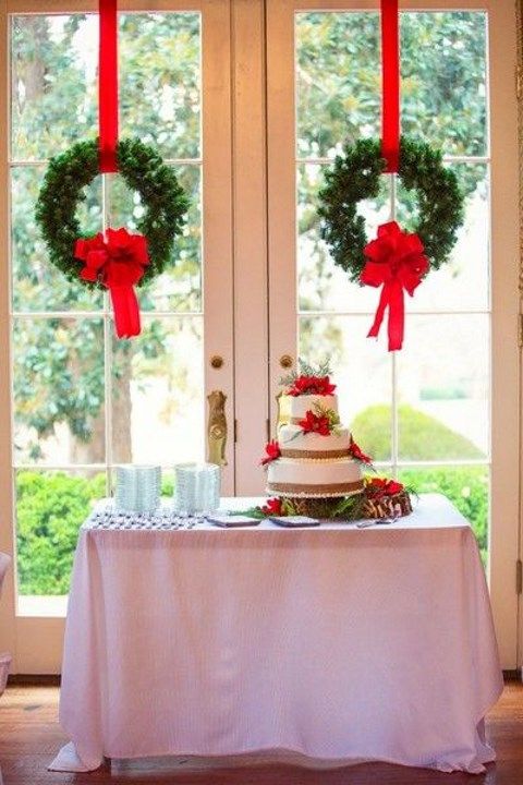 fir wreath with red ribbon is a cool idea for venue decor