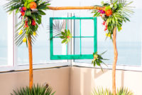 10 The wedding arch was made of sticks and a turquoise frame for a bold accents, the flowers are the same as in the bridal bouquet