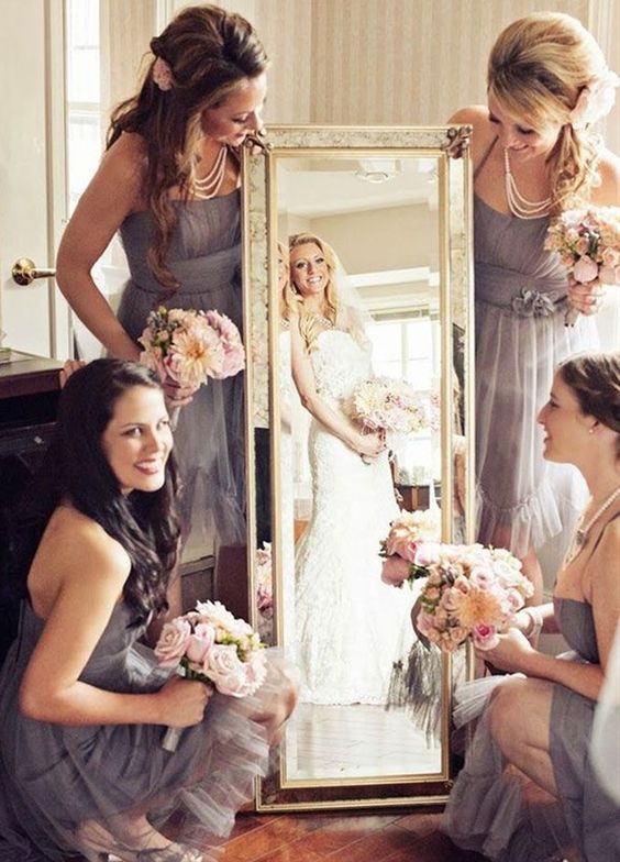 girls showing the bride in the mirror is a fun idea