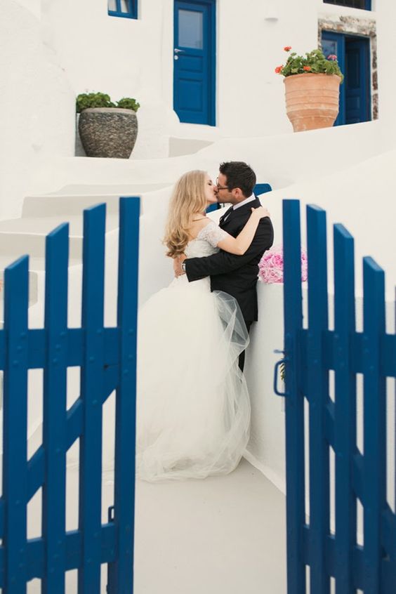 wonderful blue and white Santorini island is a gorgeous place to get married