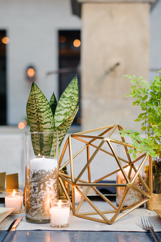 These cute gold geometric decorations and succulents were ideal for this modern wedding