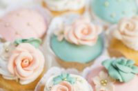 12 cupcakes with mint and peach frosting