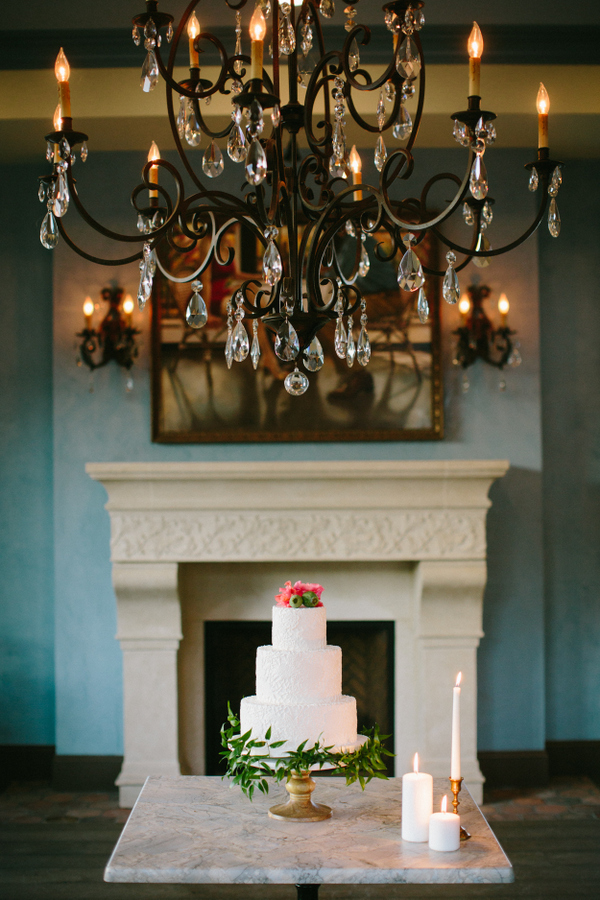 A crystal chandelier, a fireplace and a fountain can add Spanish flavor to your wedding