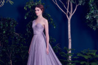 13 Elegant draped one-shoulder lavender dress with fabric on the back