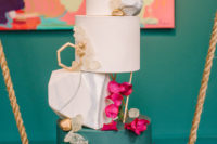 13 The wedding cake was another masterpiece in this shoot, ivory and green with geometric details and geodes