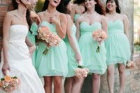 14 mint bridesmaids’ dresses, peach bouquets