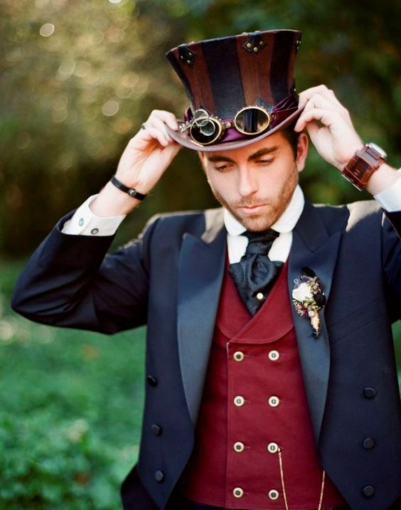 tenue de marié steampunk avec un chapeau et des lunettes google