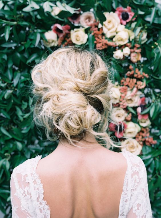 romantic tousled updo looks cool on hair with lowlights