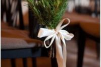 22 fir branches with a ribbon bow to decorate wedding aisles