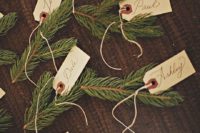 23 winter wedding place cards with fir branches
