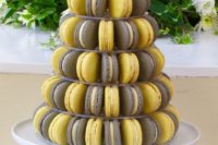 24 a macaron tower for a summer or spring weddings in grey and yellow
