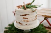 24 display a cake on a fir wreath to give it a cool rustic look
