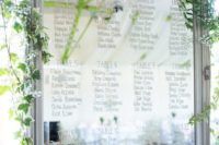 24 mirror seating plan with foliage and flowers