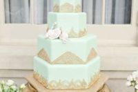 24 multi-tier mint wedding cake with gold lace