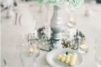 25 grey vase with mint paper flowers for a centerpiece