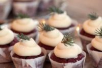 25 small evergreen pieces as cupcake toppers for a winter wedding