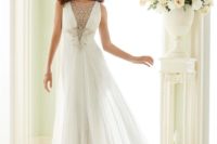 26 grecian wedding gown with an embellished illlusion neckline