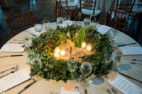 28 eucalyptus wreath, candles and fern for a winter wedding centerpiece