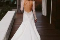 29 dramatic sleeve backless dress with a short train