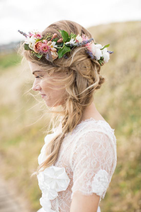 messy braid and a large fresh flower crown