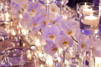 30 mirror table runners reflect light from the candles