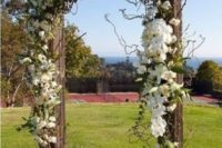 30 rustic wooden wedding arch decorated with white flowers