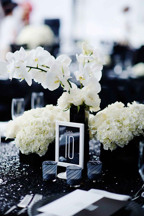 black and white framed table numbers look awesome in this table setting