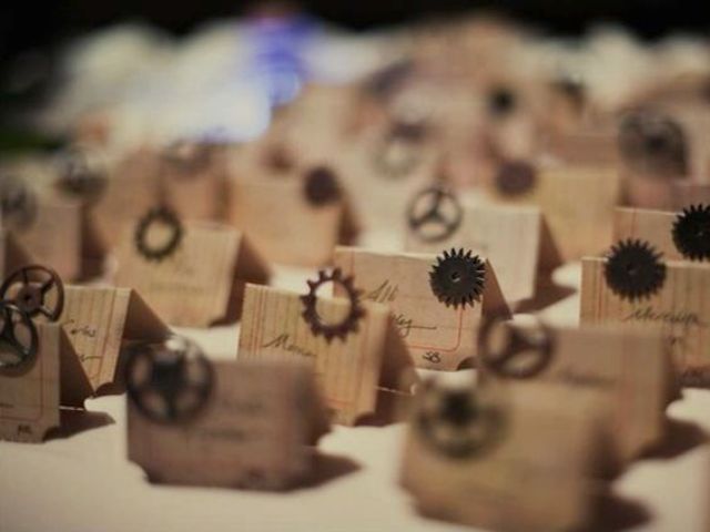 seating cards decorated with gears for a steampunk wedding