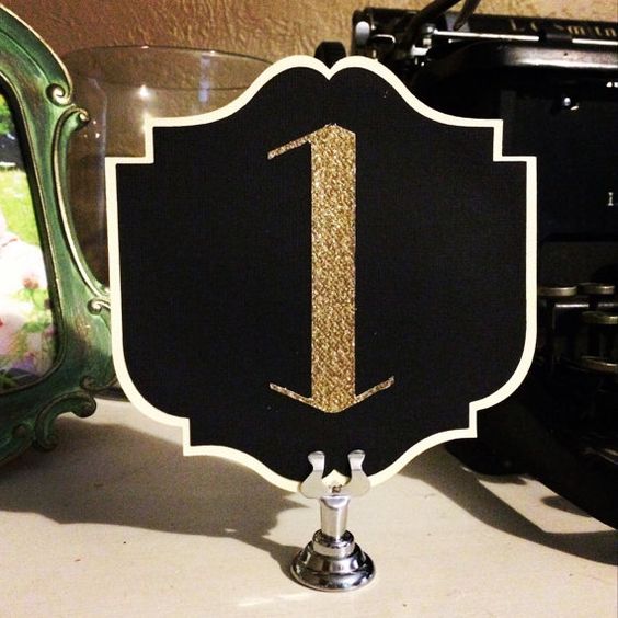 chic black and gold table number