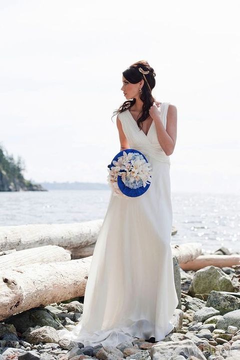 simple white V neck wedding dress is ideal for a Greek wedding