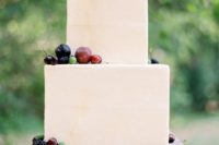 33 square ivory cake topped with fresh fruit