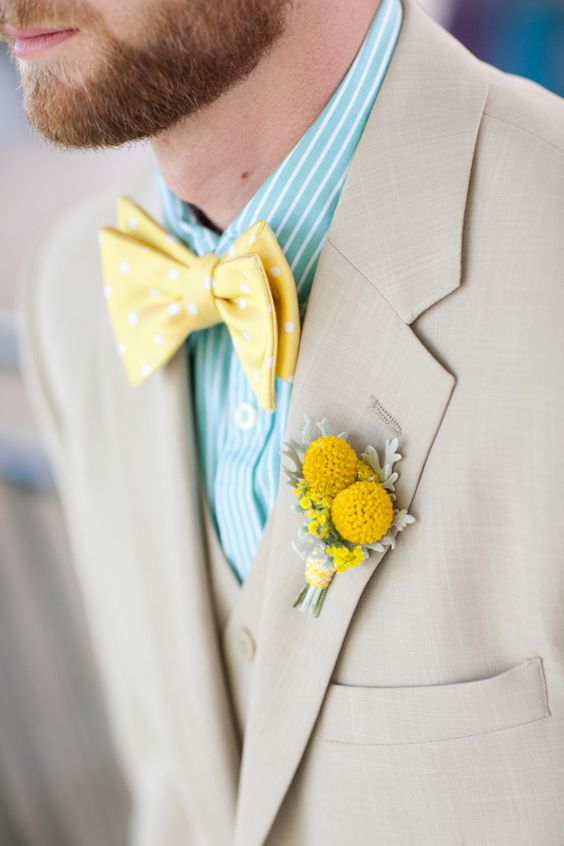a yellow polka dot bow tie and a billy ball boutonniere, a striped mint shirt