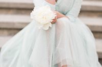34 mint bridesmaid’s separate with a tulle skirt and a sweater