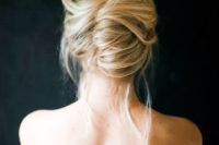 37 French-style messy twist is great for modern weddings