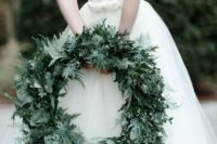 38 refined textural wreath for winter weddings