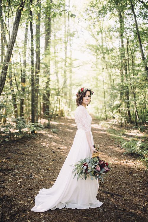 woodland bride going for a walk in the venue