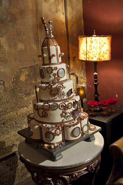cute steampunk wedding cake and metal cake toppers