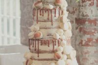 40 semi-naked copper drip wedding cake, with vanilla and coffee macarons and meringue kisses