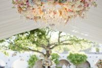 beautiful floral chandelier in pastel shades with crystal pendants for a spring wedding