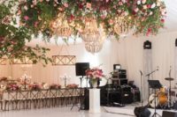 bold flower chandeliers with usual crystal ones for accentuating a dance floor