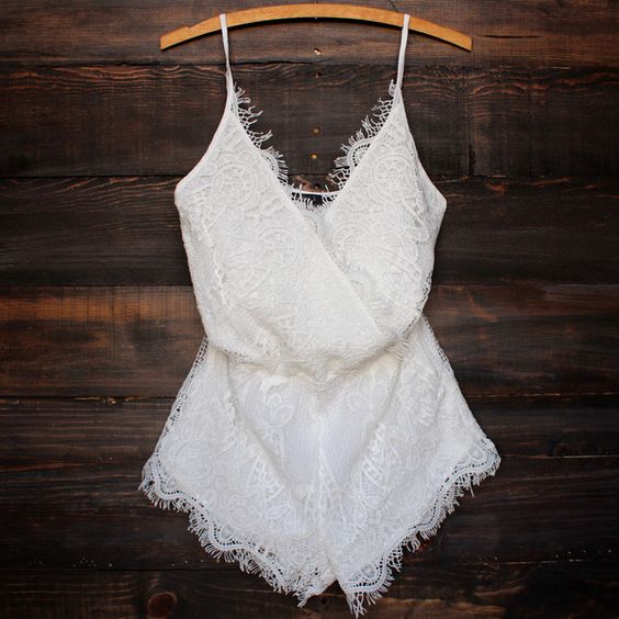 boho ivory lace romper paired with bold shoes and accessories will look amazing